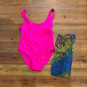 Vibrant Pink Swimsuit and Colorful Animal Print Shorts